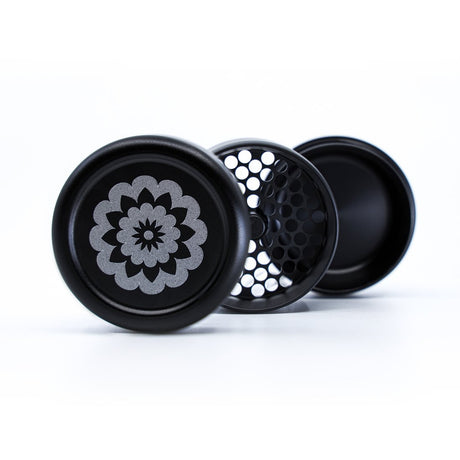  black and grey flowermill 2.5 standard herb grinder with white flowermill branding in 3 separate sections on white background