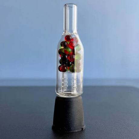 sneaky pete XL rocket stem with multi coloured internal glass beads for use with storz & bickel crafty+ & mighty+ sat on table 