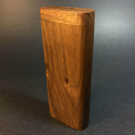 walnut xl G2 futostash for dynavap stood upright on grey background