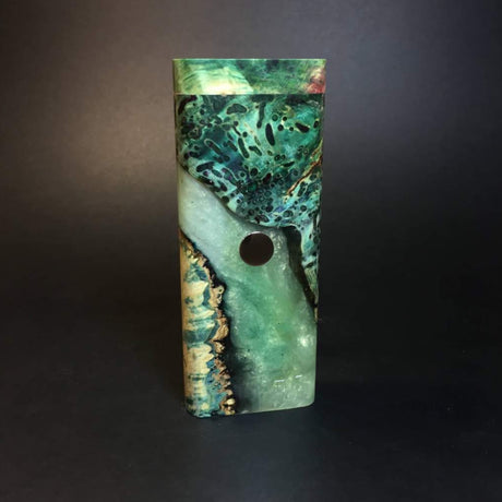 galaxy burl futostash for dynavap in green/blue shades stood upright on grey background