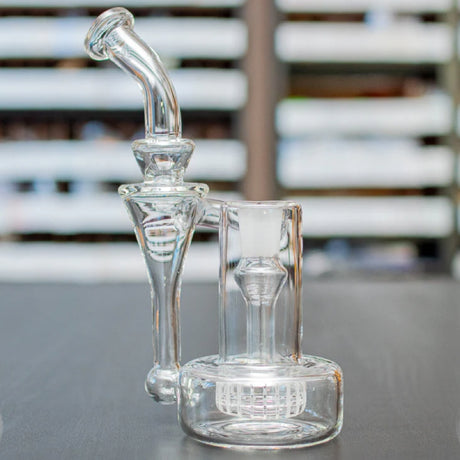 sneaky pete sidepiece glass rig sat on grey surface